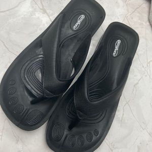 Black flip flops